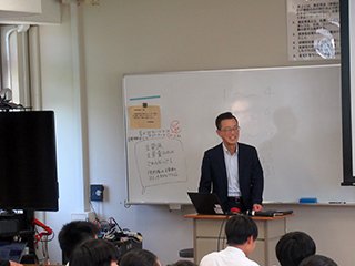 講演者の佐藤様です